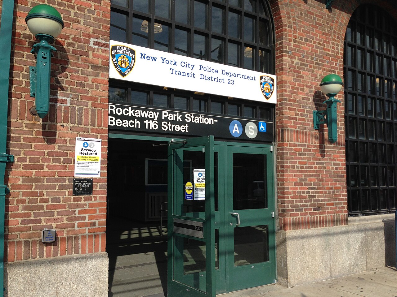 The Beach 116th Street station entrance in Rockaway Park, New York